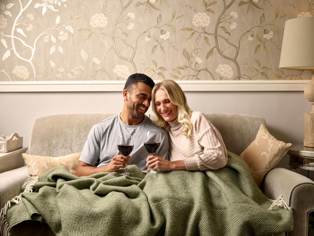 Couple relaxing on sofa