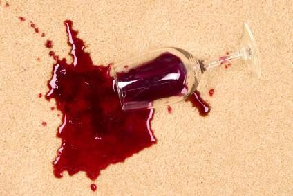 How to deal with wine spills - advice from John Cooper Carpets