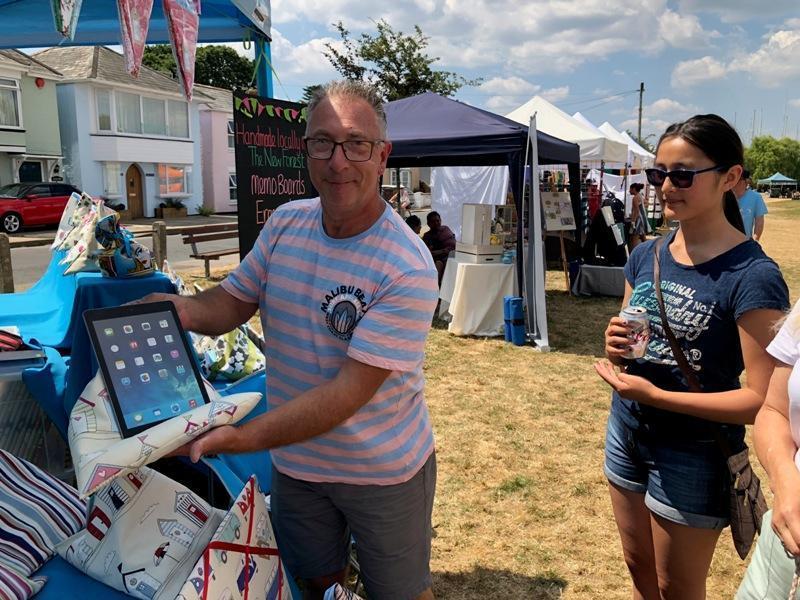 lymington artisan festival i pad stand being demonstrated