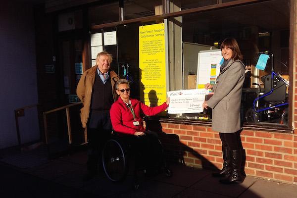 Mayor Anne Corbridge presents Jacqui Keable from New Forest Disability Information Service with a cheque for £10,000